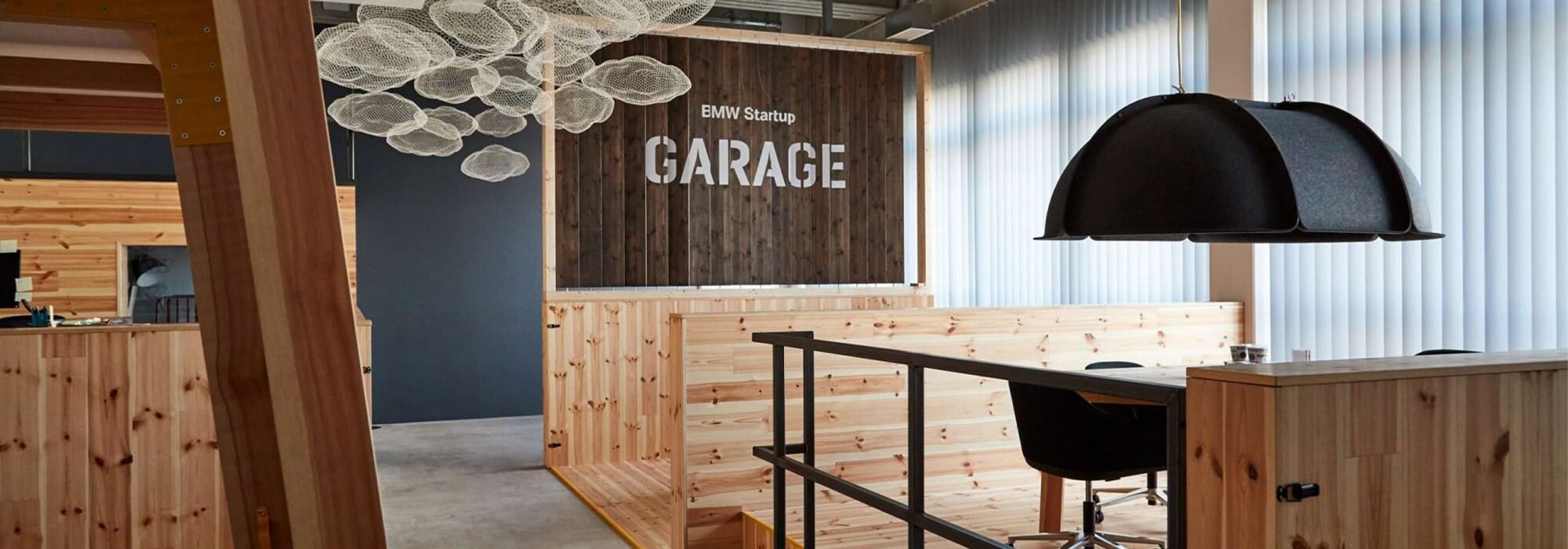 A glimpse into the BMW Group Startup Garage, a meeting place designed with lots of wood and metal.