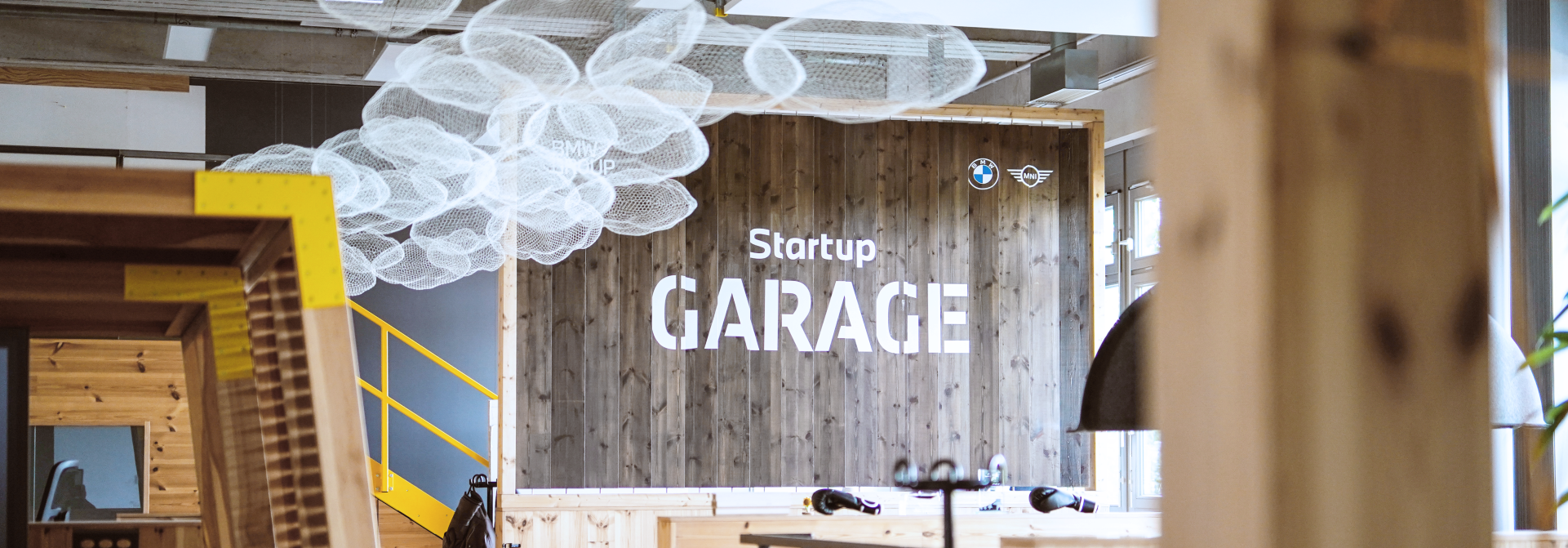 A glimpse into the BMW Group Startup Garage, a meeting place designed with lots of wood and metal.