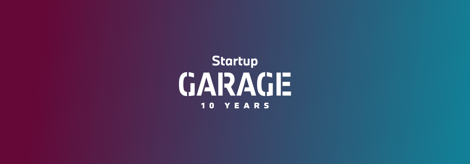 Startup Garage 10 years campaign logo in white lettering on a dark blue background that lightens from top left to bottom right.