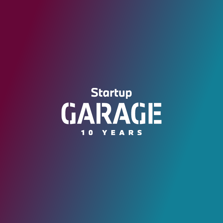 Startup Garage 10 years campaign logo in white lettering on a dark blue background that lightens from top left to bottom right.