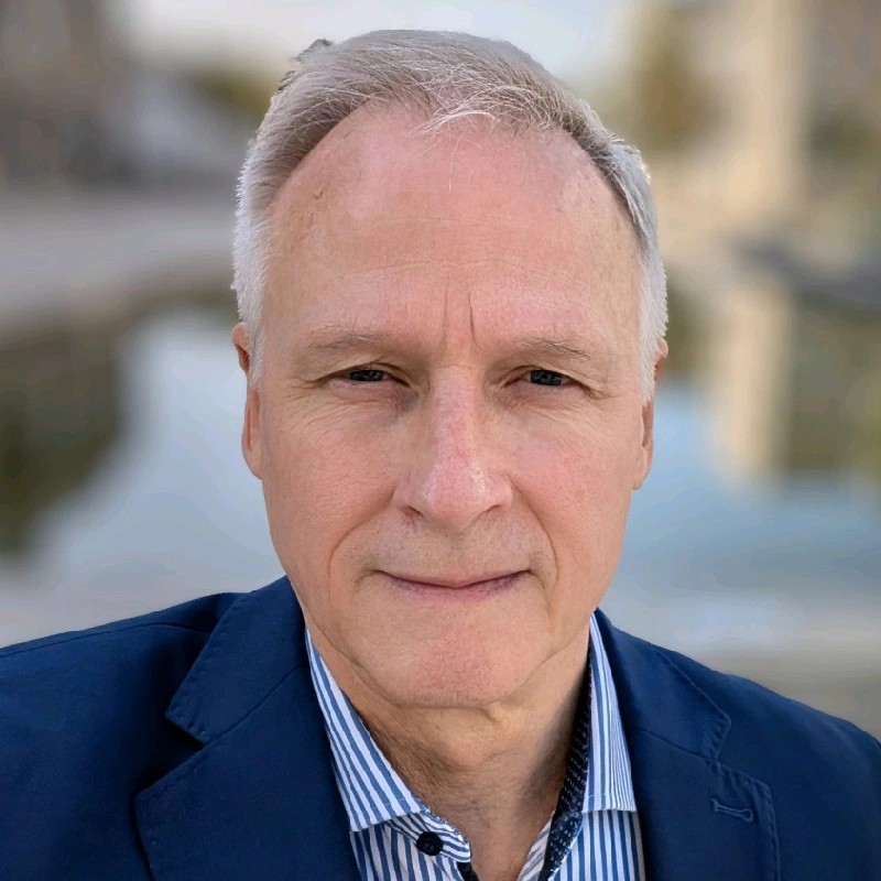 Randall Corell smiling at us.