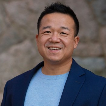 John Xin smiling at us.