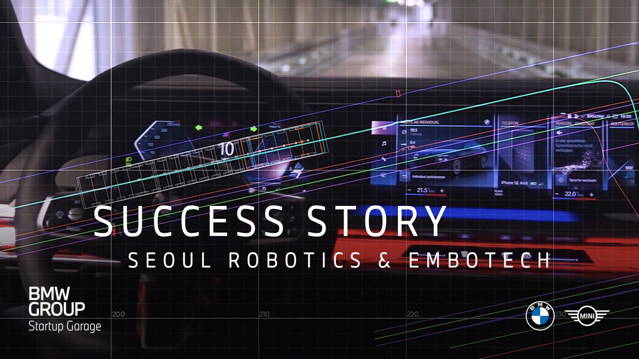A car dashboard displays multiple digital screens showing driving data and navigation visuals inside a tunnel.