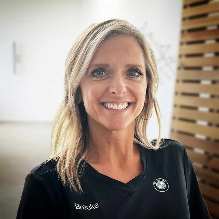 Portrait of Brooke Rennison smiling at us.